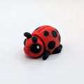 Red and black ladybird Hatchling articulated 3D-printed fidget companion
