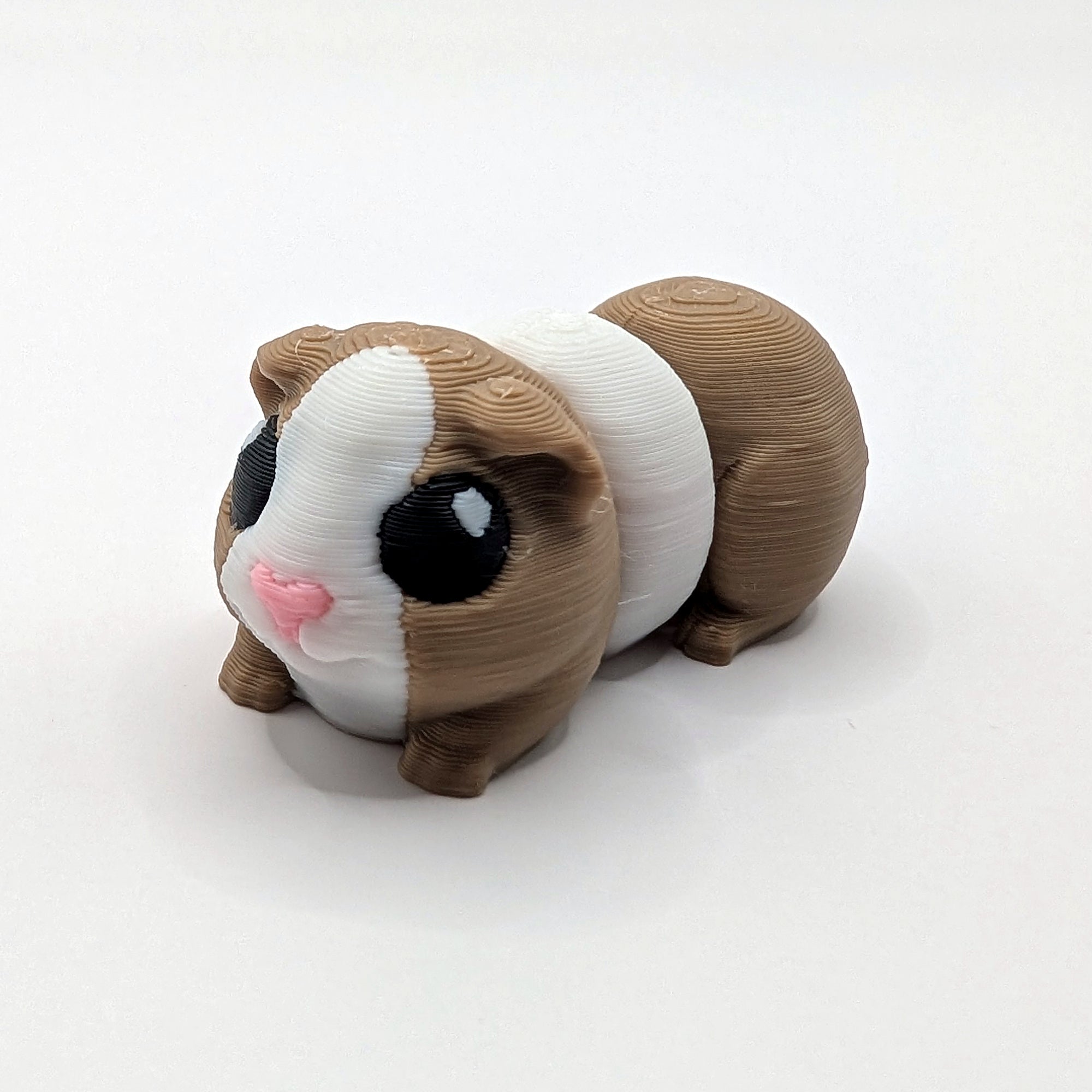 Brown white and black Guinea Pig Hatchling articulated 3D-printed fidget companion