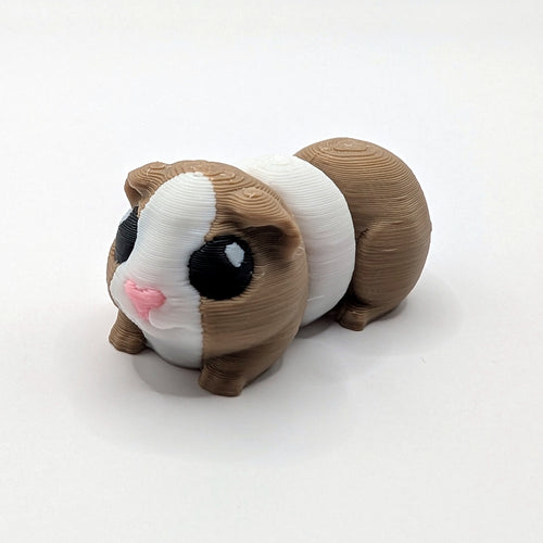 Brown white and black Guinea Pig Hatchling articulated 3D-printed fidget companion