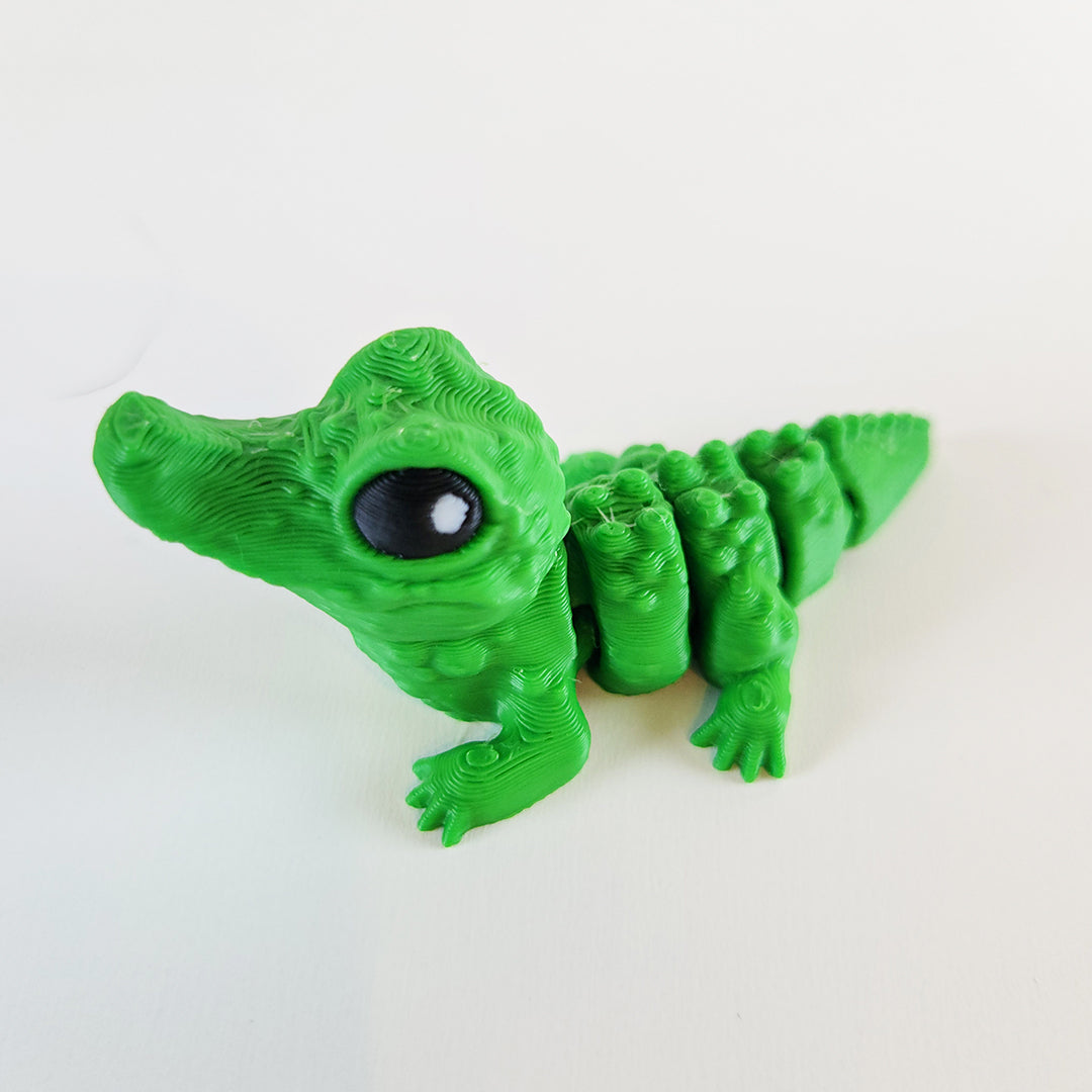 🐣 Crocodile Hatchling – Tiny Articulated Fiddle Companion