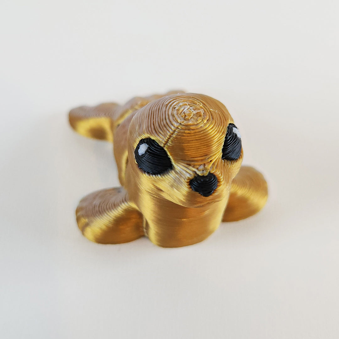 🐣 Seal Hatchling – Tiny Articulated Fiddle Companion